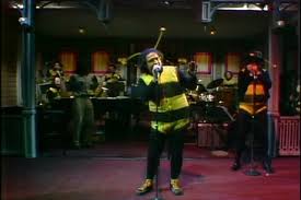 Yes, that is Dan in the background playing the harmonica...